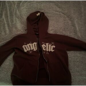 Angelic motion zip up